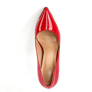 Red high-heeled shoe on a white background
