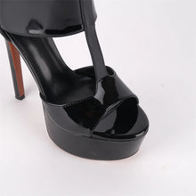 Load image into Gallery viewer, Black high-heeled shoe on a white background