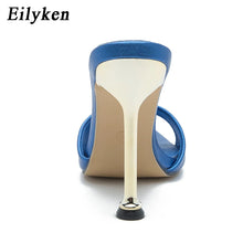 Load image into Gallery viewer, Blue high-heeled shoe with white sole on a white background, featuring the brand 'Eilyken'.