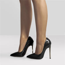 Load image into Gallery viewer, Black high-heeled shoes worn with sheer black tights on a white background