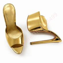 Load image into Gallery viewer, A pair of metallic gold high-heeled mule sandals with a pointed toe and open back, shown on a plain white background.