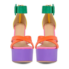 Load image into Gallery viewer, Colorful high-heeled shoes with green straps and purple platforms on a white background