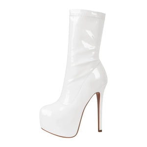 White platform high-heeled boot on a white background