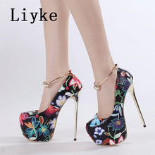 Load image into Gallery viewer, Floral high-heeled shoes worn by a person on a white background with &#39;Liyke&#39; branding.