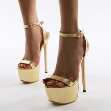 Load image into Gallery viewer, Gold high-heeled platform shoes on a white background
