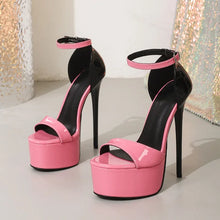 Load image into Gallery viewer, Pink and black high-heeled platform sandals on a neutral background