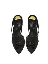 Load image into Gallery viewer, Black high-heeled shoes with criss-cross straps on a white background