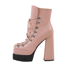 Load image into Gallery viewer, Pink platform boot with high heel on a white background