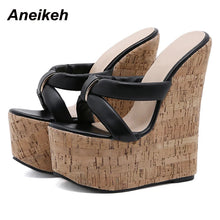 Load image into Gallery viewer, Wedge sandal with cork wedge and black straps on a white background, brand &#39;Aneikeh&#39; visible.