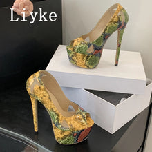 Load image into Gallery viewer, A pair of high-heeled platform pumps with a multicolor snakeskin pattern, displayed on white shoe boxes against a black and gray background. The brand name 'Liye' is visible in the top left corner.