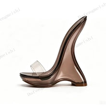 Load image into Gallery viewer, A single smoky translucent wedge heel sandal with a clear toe strap, shown in profile against a white background with faint watermark text.