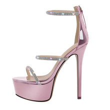 Load image into Gallery viewer, Pink high-heeled shoe with rhinestone straps on a white background