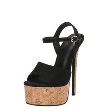 Load image into Gallery viewer, Black high-heeled sandal with cork platform on a white background