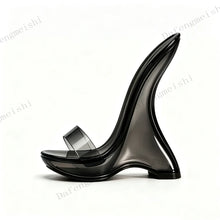 Load image into Gallery viewer, A single black translucent high-heeled sandal with a curved sculptural heel and a wide transparent toe strap, shown on a plain white background.