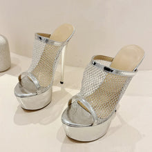 Load image into Gallery viewer, Pair of silver high-heeled shoes on a light background