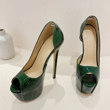 Load image into Gallery viewer, Green high-heeled shoes on a white surface with a neutral background