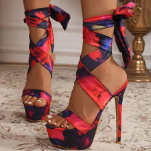 Load image into Gallery viewer, Colorful high-heeled sandals with platform on a patterned surface