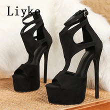 Load image into Gallery viewer, Black high-heeled platform sandals with 'Liyke' branding on a textured surface.