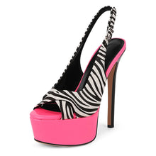 Load image into Gallery viewer, High-heeled shoe with zebra pattern and pink platform on a white background
