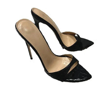 Load image into Gallery viewer, A pair of black pointed-toe high heels with stiletto heels and cutout straps, shown on a plain white background.