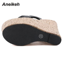 Load image into Gallery viewer, Cork sandal sole with black insole on a white background, featuring the brand &#39;Aneikeh&#39;.