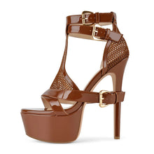 Load image into Gallery viewer, A single brown platform high-heeled sandal with ankle straps, T-strap detailing, and gold-tone buckle hardware, shown against a plain white background.