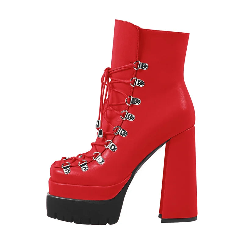 Red platform boot with black sole on a white background