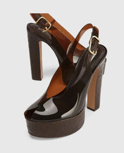 Load image into Gallery viewer, Black high-heeled platform sandal on a light gray background