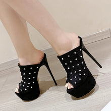Load image into Gallery viewer, Black stiletto heels with pearl embellishments on a neutral background