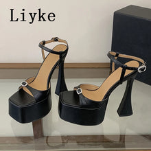 Load image into Gallery viewer, Black high-heeled platform sandals with 'Liyke' branding on a reflective surface.