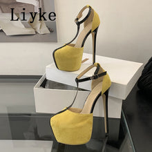 Load image into Gallery viewer, Yellow high-heeled shoes with black straps on a white platform, branded &#39;Liyke&#39;.