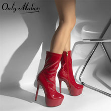 Load image into Gallery viewer, Red high-heeled platform boots worn by a person on a white background with &#39;Only Maker&#39; branding.