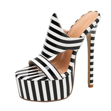 Load image into Gallery viewer, A single high-heeled platform sandal with a glossy black and white striped pattern, featuring a cutout toe, slingback design, and a slim stiletto heel on a white background.