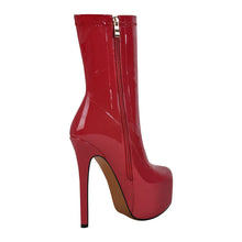 Load image into Gallery viewer, Red high-heeled boot with a gold zipper on a white background