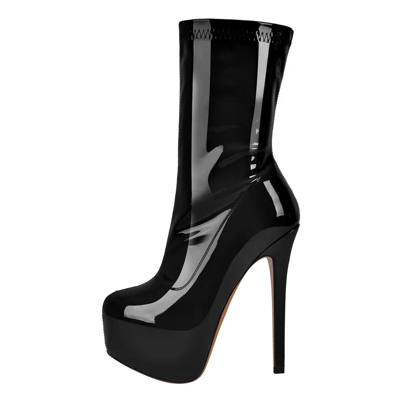 Black high-heeled platform boot on a white background
