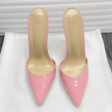 Load image into Gallery viewer, A pair of glossy light pink pointed-toe mule heels with beige insoles, displayed on a white fabric surface.