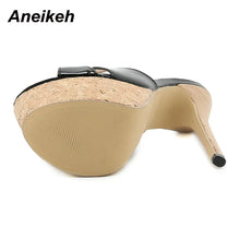 Load image into Gallery viewer, Beige high-heeled shoe with cork sole on a white background, featuring the brand &#39;Aneikeh&#39;.