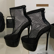 Load image into Gallery viewer, Black mesh platform high-heeled shoes on a reflective surface with a blurred background.