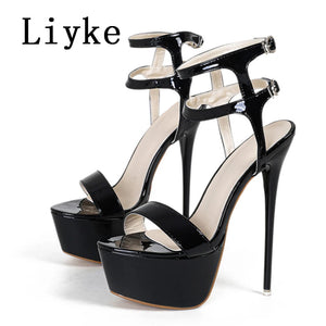 Black high-heeled platform sandals with 'Liyke' branding on a white background