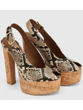 Load image into Gallery viewer, Pair of high-heeled shoes with snake print and cork platform on a white background