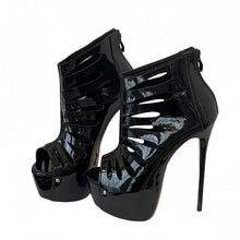 Load image into Gallery viewer, Black high-heeled platform shoes with cut-out design on a white background