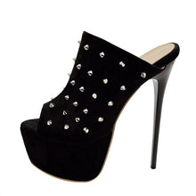 Load image into Gallery viewer, Black high-heeled shoe with silver studs on a white background