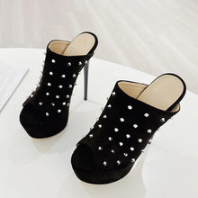Load image into Gallery viewer, Black studded high-heeled shoes on a white background