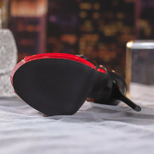 Load image into Gallery viewer, Black and red electronic device on a white surface with a blurred background