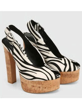 Load image into Gallery viewer, Zebra print platform shoes with cork platforms on a white background